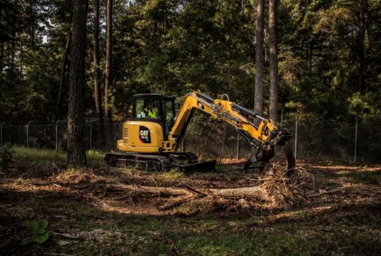 Cat® 420F2 Backhoe Loader with Thumb and Ripper in Working Application